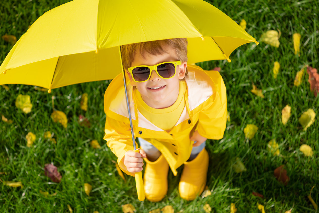 Happy Kid with Umbrella    